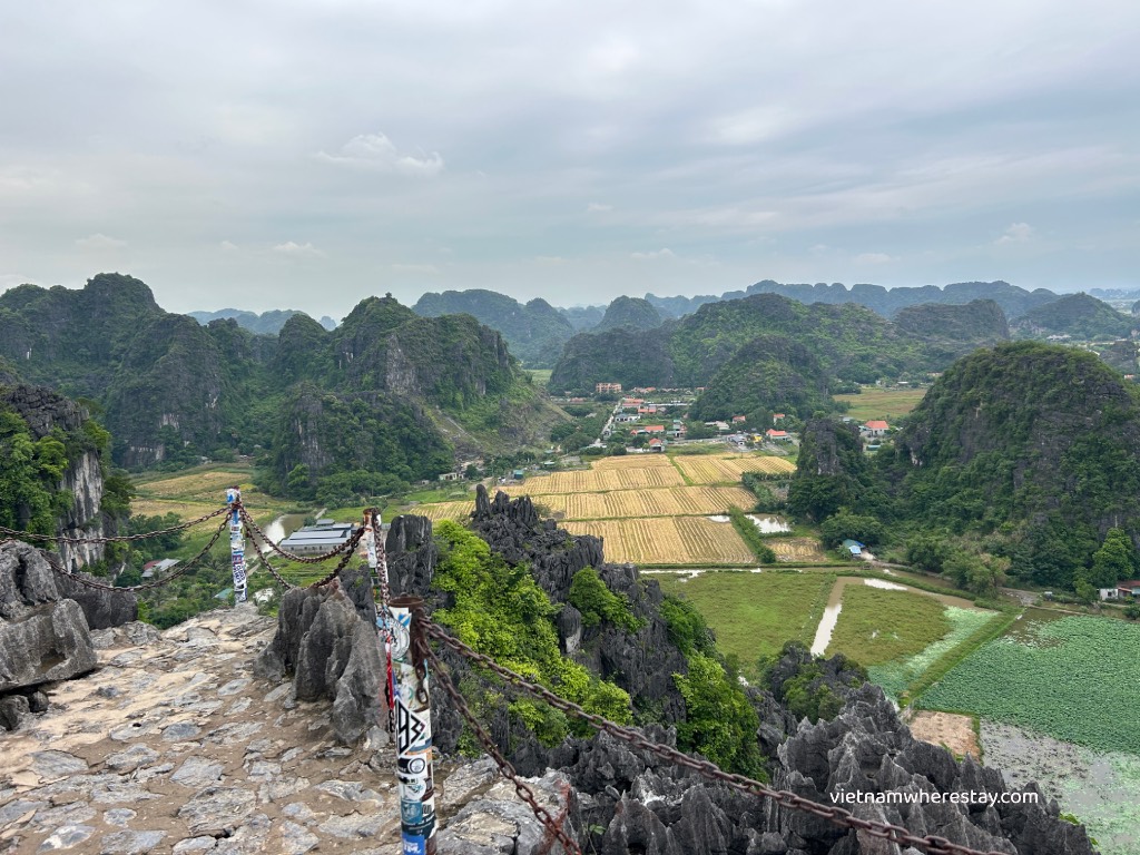 Views from the small temple peak at Mua Cave
